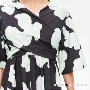 Merimekko dress with wrap tie overlay top